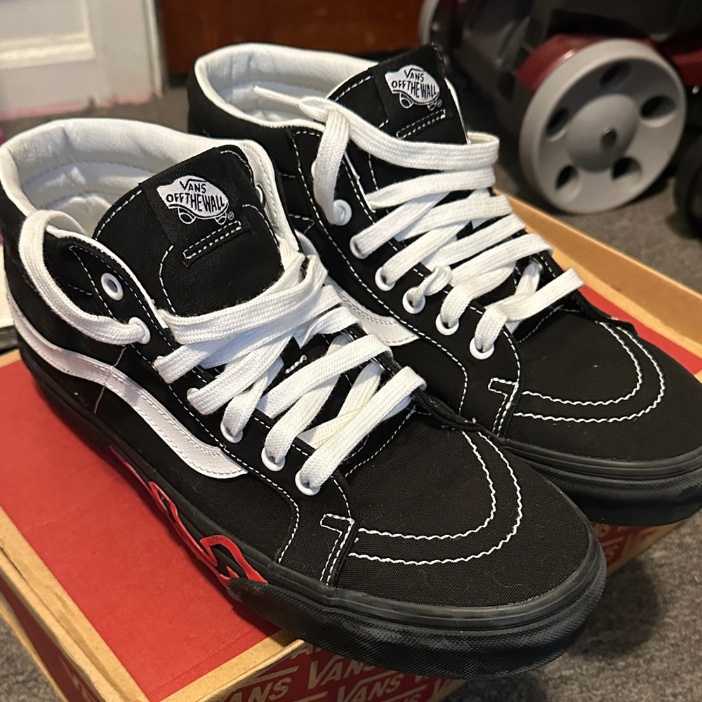 Vans Black and White High-Top Sneakers